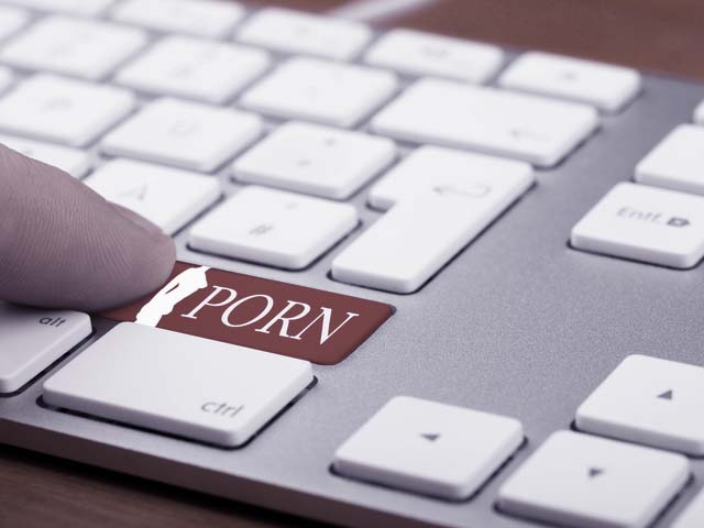 an image of a keyboard with the word porn printed on it